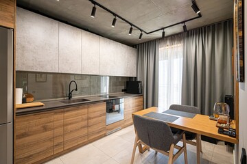 interior apartment kitchen and dining room, refectory area, cooking equipment, table furniture, stove