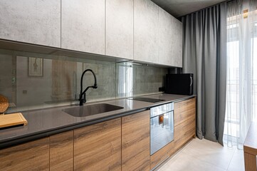 interior apartment kitchen and dining room, refectory area, cooking equipment, table furniture, stove