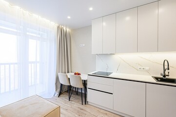 interior apartment kitchen and dining room, refectory area, cooking equipment, table furniture, stove