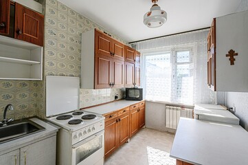 interior apartment kitchen and dining room, refectory area, cooking equipment, table furniture, stove