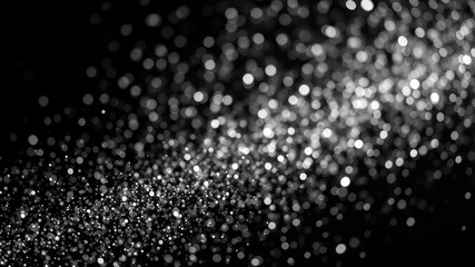 Fototapeta premium Abstract grayscale bokeh background with swirling light particles