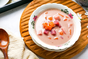Bubur Cha Cha is a creamy coconut dessert with colorful cubes of purple, orange, and white sweet potatoes and yam. A traditional Southeast Asian dessert, particularly popular in Malaysia and Singapore