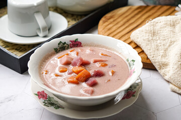 Bubur Cha Cha is a creamy coconut dessert with colorful cubes of purple, orange, and white sweet potatoes and yam. A traditional Southeast Asian dessert, particularly popular in Malaysia and Singapore