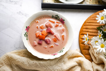 Bubur Cha Cha is a creamy coconut dessert with colorful cubes of purple, orange, and white sweet potatoes and yam. A traditional Southeast Asian dessert, particularly popular in Malaysia and Singapore
