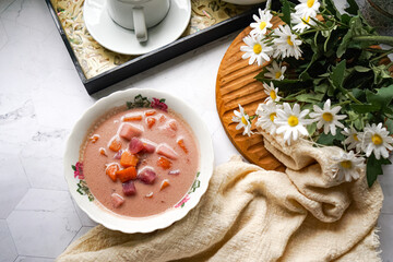 Bubur Cha Cha is a creamy coconut dessert with colorful cubes of purple, orange, and white sweet potatoes and yam. A traditional Southeast Asian dessert, particularly popular in Malaysia and Singapore