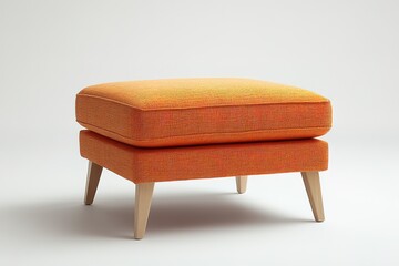 detailed studio shot of compact ottoman in vibrant orange fabric with subtle texture resting on wooden legs with natural
