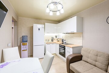interior apartment kitchen and dining room, refectory area, cooking equipment, table furniture, stove