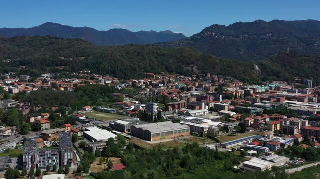 An engaging aerial overview of Via Pasquale Paoli in Como. Admire the urban structure, with buildings of various types and roads that make this area a central point for traffic and city development.