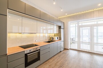 interior apartment kitchen and dining room, refectory area, cooking equipment, table furniture, stove