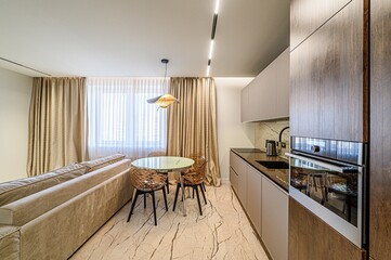 interior apartment kitchen and dining room, refectory area, cooking equipment, table furniture, stove