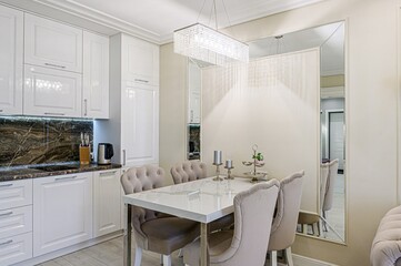 interior apartment kitchen and dining room, refectory area, cooking equipment, table furniture, stove