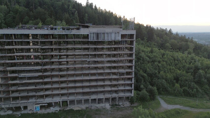 Uninhabited hotel in wooded region