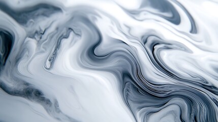 Obraz premium Abstract swirls of white and grey blending seamlessly into each other, creating a smooth gradient effect.