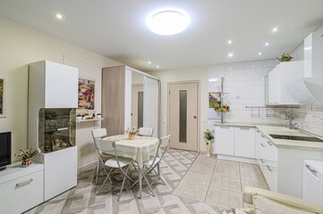 interior apartment kitchen and dining room, refectory area, cooking equipment, table furniture, stove
