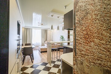 interior apartment kitchen and dining room, refectory area, cooking equipment, table furniture, stove