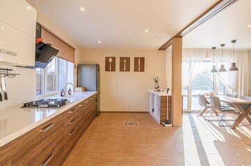 interior apartment kitchen and dining room, refectory area, cooking equipment, table furniture, stove