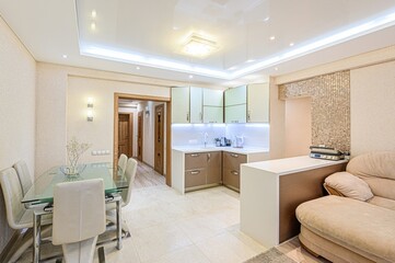 interior apartment kitchen and dining room, refectory area, cooking equipment, table furniture, stove