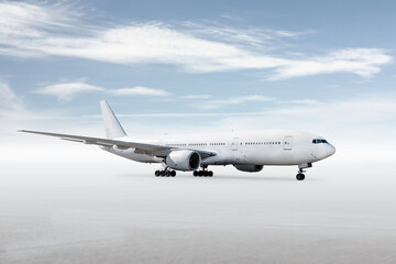 White wide body passenger jetliner isolated on bright background with sky