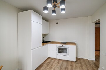 interior apartment kitchen and dining room, refectory area, cooking equipment, table furniture,...