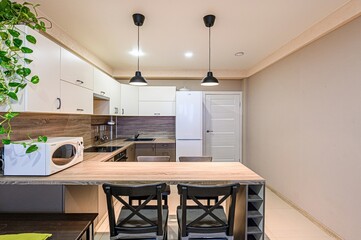 interior apartment kitchen and dining room, refectory area, cooking equipment, table furniture,...