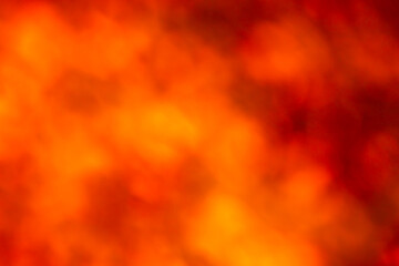 Abstract bright red background out of focus bokeh.
