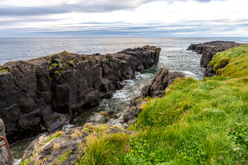 Vatnsnes peninsula, situated on the east coast of Iceland, boasts rocky cliffs overlooking the ocean