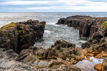 Iceland’s Vatnsnes peninsula is known for its rugged rocky cliffs along the eastern coastline