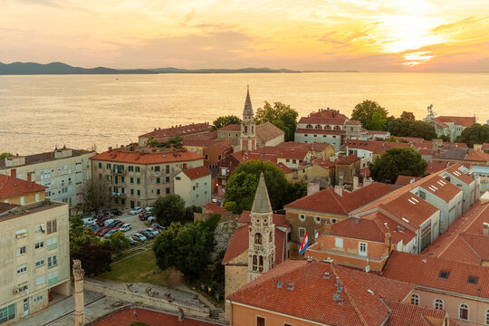 Cityscape of Zadar old town, Croatia at sunset with historic architecture and the Adriatic Sea