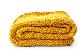 Isolated top view of a lovely yellow knitted throw on white