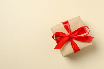 Beautiful gift box on color background