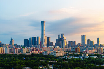 Fototapeta premium Skyline of Beijing CBD area at sunset, with cloud in the sky