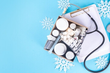 Box with various medicines, pills, sprays for cold and flu viruses treatment
