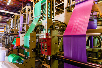 The mass production of plastic bags. The plastic bags manufacturing process by automatic system.