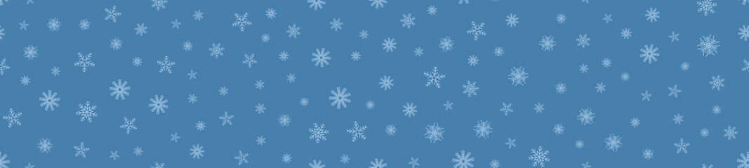 Winter seamless pattern with snowflakes