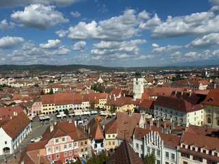 Historic Buildings in Sibiu's Old Town under Clear Blue Skies