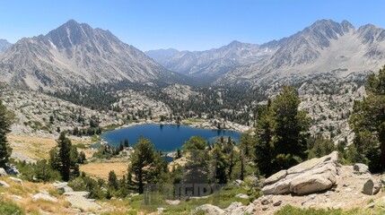 Obraz premium Majestic Mountain Lake Panorama: A Breathtaking View of Serenity in the High Sierra