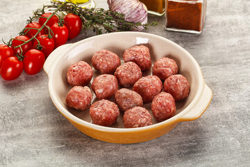 Uncooked raw beef meatball minced