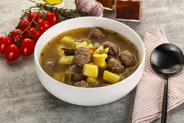 Soup with meatball and potato