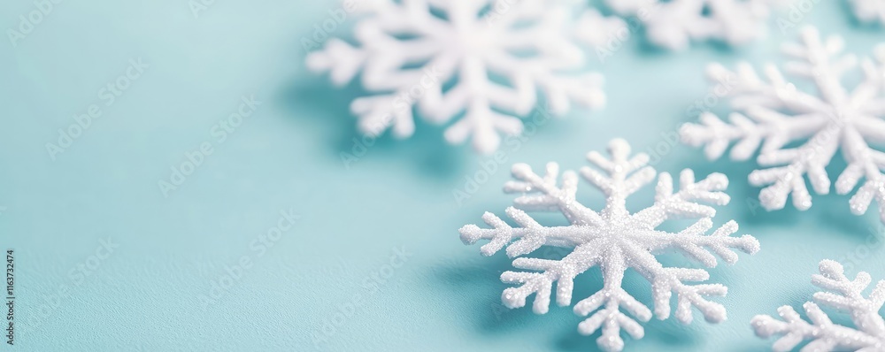 Poster snowflake abstract background concept. delicate snowflakes on a soft blue surface, creating a serene