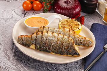 Grilled seabass fillet with lemon