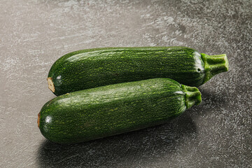 Raw green ripe zucchini vegetable