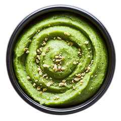 green pea puree with crumble topping in black bowl
