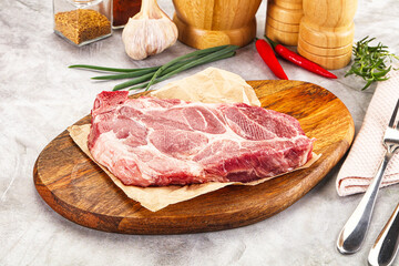 Raw pork neck steak for grill
