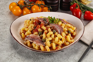 Italian pasta cellentani with anchovy