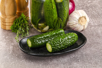 Homemade lighty salted cucumbers with herbs