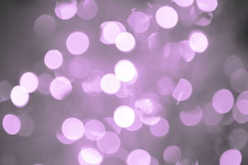 Purple, magenta, indigo bokeh background with soft, circular light spots in varying sizes. The dreamy, out-of-focus effect creates an abstract, atmospheric, and versatile backdrop