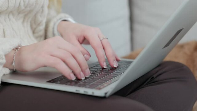Close Up of Female Hands Using Laptop Keyboard