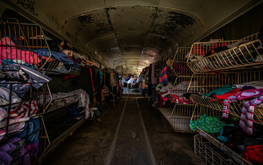 abandoned junkyard, forgotten items, dusty bottles, antiques, cluttered interiors, old clothing,...