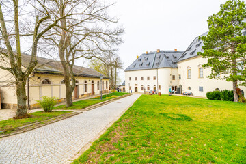 The Konigstein Fortress, a monumental structure in Saxony, Germany, showcases its impressive architecture and beautiful surroundings, inviting visitors to explore its rich history and scenic views.