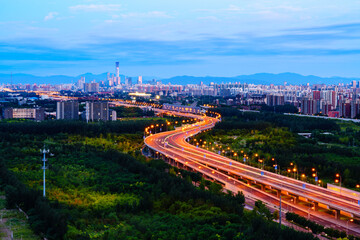 Night view of winding road to Beijing CBD area before sunrise